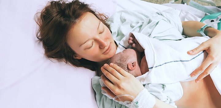 Mum postpartum with baby