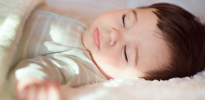 Baby sleeping in crib