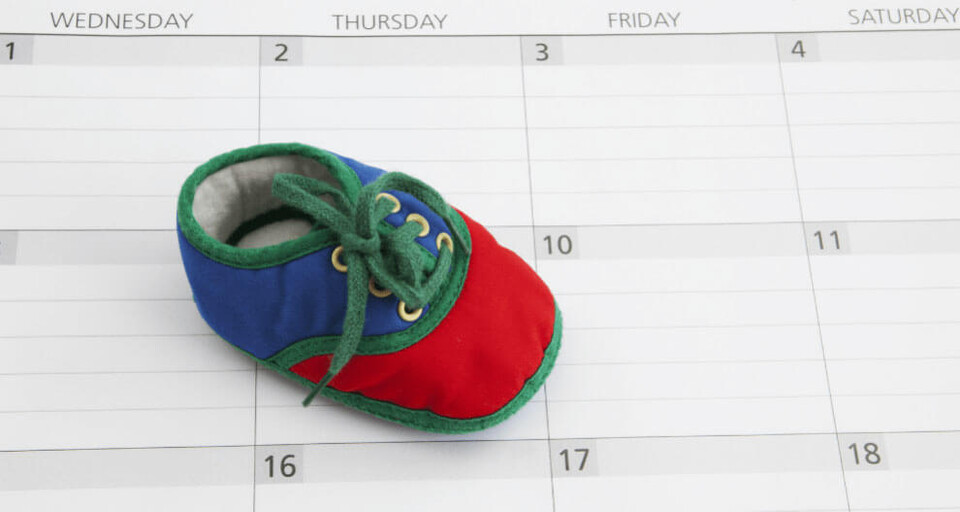 Baby shoes on a calendar