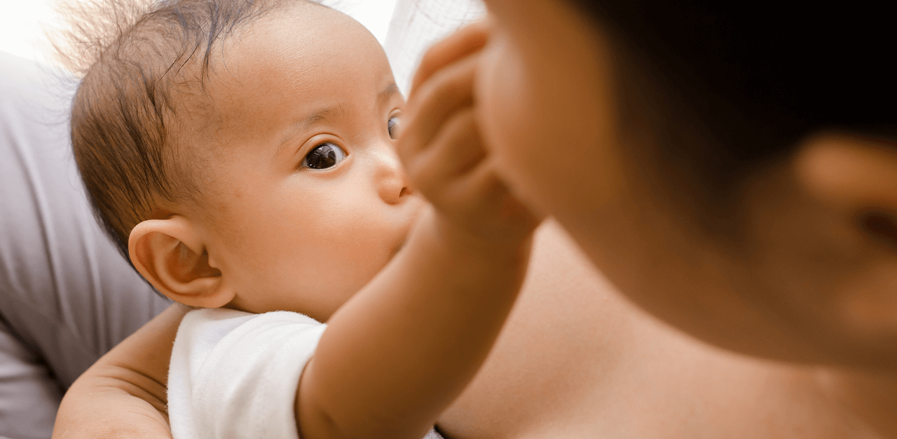 Baby touching unknown mothers face