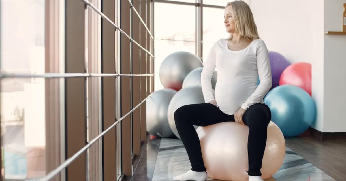 Pregnant woman on exercise ball