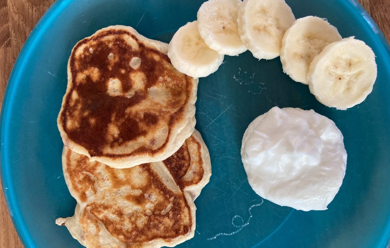 Homemade weaning pancakes with banana and yoghurt
